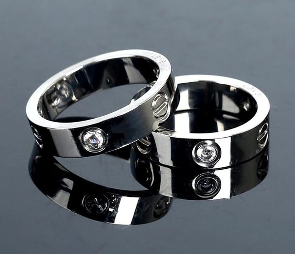 Popular Men womens fashion couple rings Luxury brand Gold Silver diamond classics Round finger ring Original Box
Popular Men womens fashion couple rings Luxury brand Gold Silver diamond classics Round finger ring Original Box