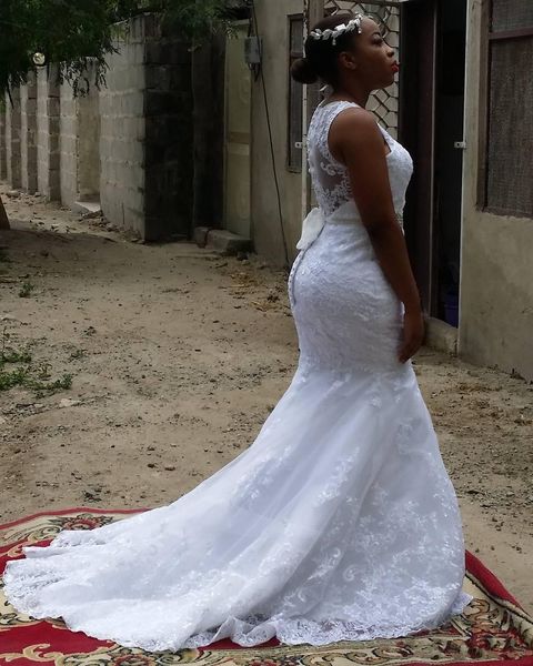 Mermaid Lace Wedding Gowns with Beaded Belt and Sexy Sheer Deep V Neck Illusion Back with Covered Buttons Wedding Dresses
Mermaid Lace Wedding Gowns with Beaded Belt and Sexy Sheer Deep V Neck Illusion Back with Covered Buttons Wedding Dresses