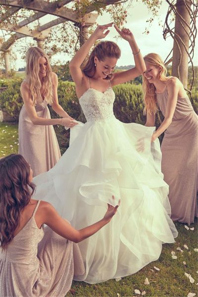sensational layered organza see through ruffled bridal gown sparkling beaded lace bodice spaghetti straps wedding dress, White
sensational layered organza see through ruffled bridal gown sparkling beaded lace bodice spaghetti straps wedding dress, White