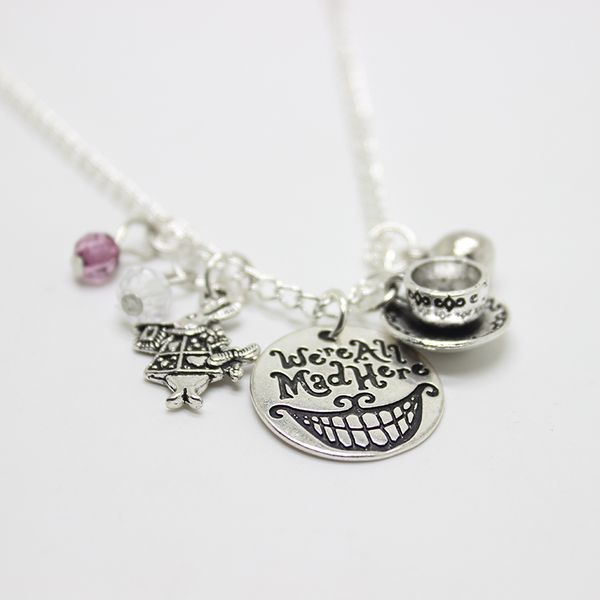 12pcs/lot We're All Mad Here Alice in Wonderland Mad Hatter Hand Stamped charm Pendant Cat Smile Gift Fairytale Jewlery
12pcs/lot We're All Mad Here Alice in Wonderland Mad Hatter Hand Stamped charm Pendant Cat Smile Gift Fairytale Jewlery