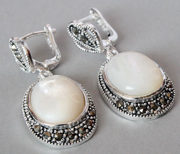 handmade lady's 925 silver white sea shell marcasit earrings 11/2, Golden;silver
handmade lady's 925 silver white sea shell marcasit earrings 11/2, Golden;silver