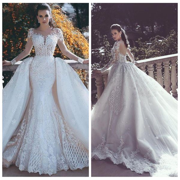 2021 luxurious lace appliques mermaid wedding dresses detachable train plunging neck long sleeves beaded overskirt dubai arabic bridal gowns, White
2021 luxurious lace appliques mermaid wedding dresses detachable train plunging neck long sleeves beaded overskirt dubai arabic bridal gowns, White