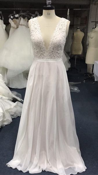 capped v neck chiffon beach wedding dresses with lace appliques 2019 white ivory wedding gowns floor length
capped v neck chiffon beach wedding dresses with lace appliques 2019 white ivory wedding gowns floor length