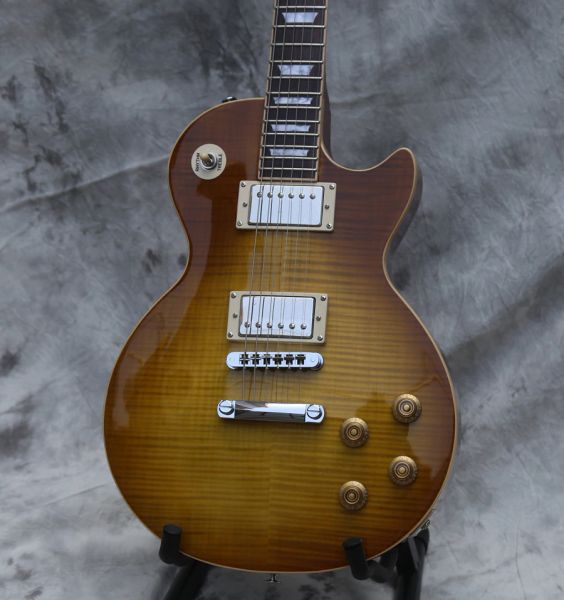 custom flame maple amber sunburst electric guitar mahogany body, rosewood fingerboard, bone nut, white tulip tuners, chrome hardware
custom flame maple amber sunburst electric guitar mahogany body, rosewood fingerboard, bone nut, white tulip tuners, chrome hardware