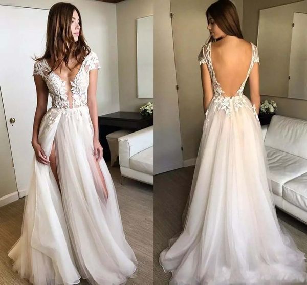 custom lace beach wedding dresses 2020 with appliques beads flowers side slit v neck backless sweep train a line bridal gowns, White
custom lace beach wedding dresses 2020 with appliques beads flowers side slit v neck backless sweep train a line bridal gowns, White