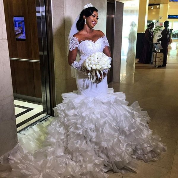 charming plus size wedding dress sheer neck lace applique long sleeve african bridal gowns gorgeous tiered organza mermaid wedding gowns, White
charming plus size wedding dress sheer neck lace applique long sleeve african bridal gowns gorgeous tiered organza mermaid wedding gowns, White