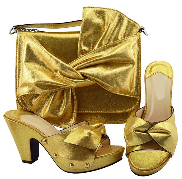 wonderful gold women pumps and big bag with bowtie design african shoes match handbag set for dress ym006,heel 9.5cm
wonderful gold women pumps and big bag with bowtie design african shoes match handbag set for dress ym006,heel 9.5cm