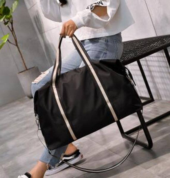 portable travel bag female large capacity shoulder short travel bag leisure handbag
portable travel bag female large capacity shoulder short travel bag leisure handbag