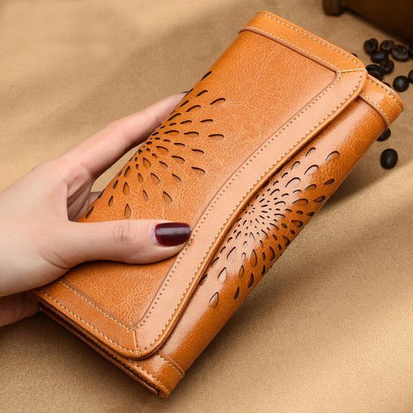 2018 new fashion hollow wallet female long section of large-capacity women's wallet bags, Red;black
2018 new fashion hollow wallet female long section of large-capacity women's wallet bags, Red;black