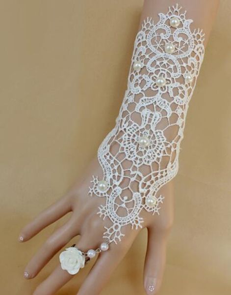 new bridal wedding dress is accessorised with white lace bracelet and ring chain, fashionable and elegant, Golden;silver
new bridal wedding dress is accessorised with white lace bracelet and ring chain, fashionable and elegant, Golden;silver