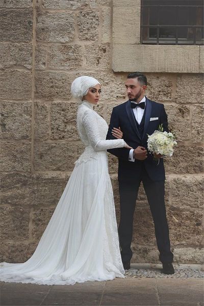 New Gorgeous Lace Applique Muslin Wedding Dresses High Neck Long Sleeve A-Line Vintage Bridal Gowns India Wedding Gowns
New Gorgeous Lace Applique Muslin Wedding Dresses High Neck Long Sleeve A-Line Vintage Bridal Gowns India Wedding Gowns