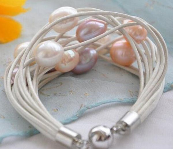 15strands white pink lavender rice pearl white leather bracelet, Golden;silver
15strands white pink lavender rice pearl white leather bracelet, Golden;silver