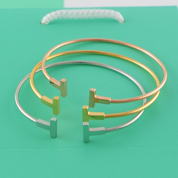 Brand name Top Quality 316L Stainless Steel punk opened bracelet with double T and diamond for women jewelry gift wedding Free shipping PS62
Brand name Top Quality 316L Stainless Steel punk opened bracelet with double T and diamond for women jewelry gift wedding Free shipping PS62