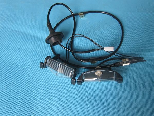 rear bumper license number plate light contain 2 lamps and wires for mazda 3 2005 bk bs1e-51-270
rear bumper license number plate light contain 2 lamps and wires for mazda 3 2005 bk bs1e-51-270