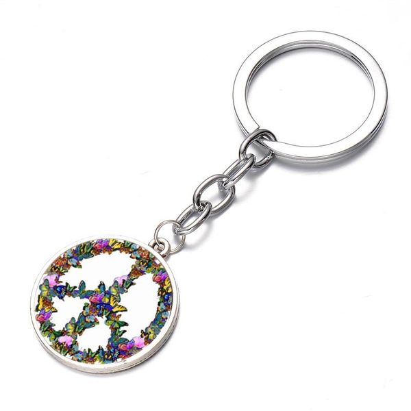 Novelty Butterfly Combination Peace Sign Keychain DIY Hippie Peace Bus Sign Glass Cabochon Pendant Charm Key Ring Holder
Novelty Butterfly Combination Peace Sign Keychain DIY Hippie Peace Bus Sign Glass Cabochon Pendant Charm Key Ring Holder