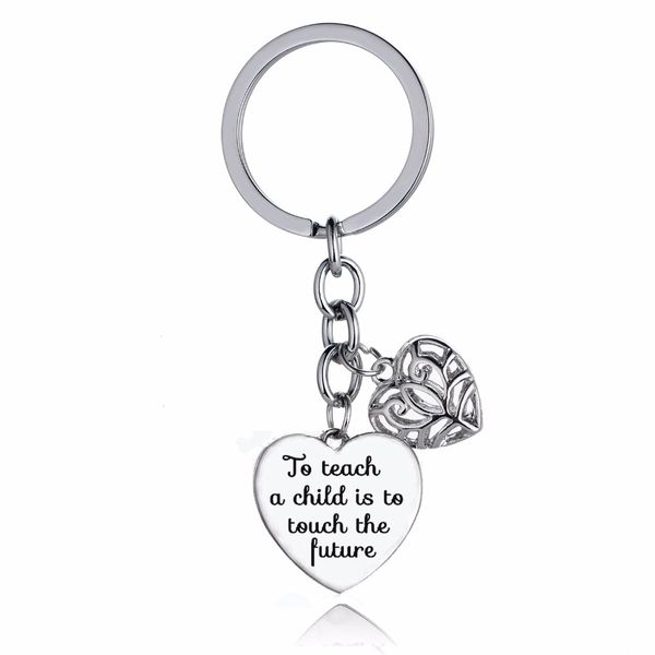 12pc/lot hollow heart charms teachers keychain gifts to teach a child is to touch the future keyring teacher jewelry key chains, Silver
12pc/lot hollow heart charms teachers keychain gifts to teach a child is to touch the future keyring teacher jewelry key chains, Silver