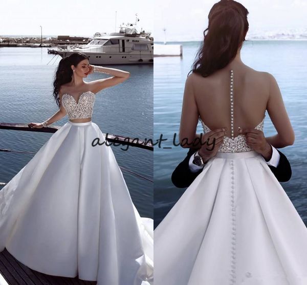 see through wedding gowns sweetheart buttons back a lin satin floor length design fashionable bridal engagement dresses arabic, White
see through wedding gowns sweetheart buttons back a lin satin floor length design fashionable bridal engagement dresses arabic, White