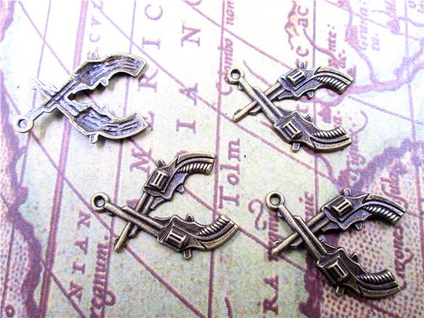 36pcs--gun charms, antique bronze double gun revolver handgun charm pendants 31x24mm, Bronze;silver
36pcs--gun charms, antique bronze double gun revolver handgun charm pendants 31x24mm, Bronze;silver