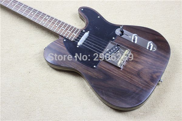 rare george harrison tl tele brown electric guitar rosewood body & neck, string thru body, 3 gold brass saddle bridge, custom shop v logo
rare george harrison tl tele brown electric guitar rosewood body & neck, string thru body, 3 gold brass saddle bridge, custom shop v logo