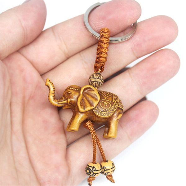 classic lucky elephant carving wooden pendant keychain key ring chain evil defends gift presents, Slivery;golden
classic lucky elephant carving wooden pendant keychain key ring chain evil defends gift presents, Slivery;golden