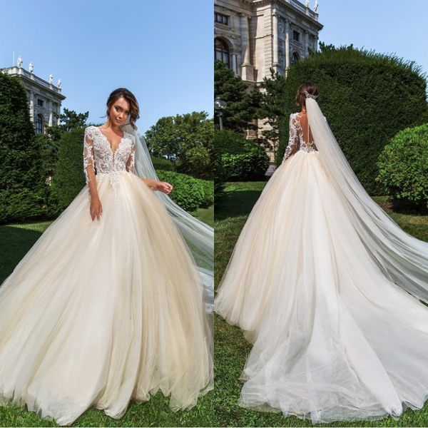 

Crystal Design Sheer Jewel Neck Lace Ball Gown Wedding Dresses 2019 With Long Sleeves Champagne Plus Size Wedding Dress Bridal Gowns