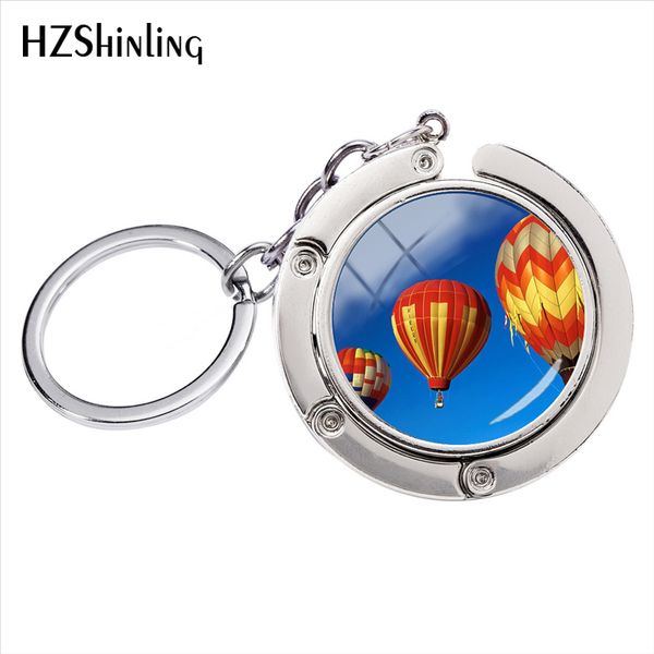 new arrival fashion beautiful air balloon art ps glass cabochon round bag holder silver alloy key rings
new arrival fashion beautiful air balloon art ps glass cabochon round bag holder silver alloy key rings