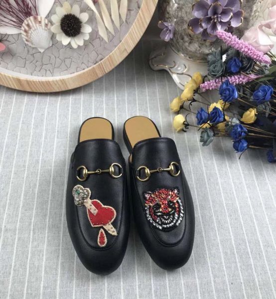 the latest brand of slippers leather + arrow piercing heart with crystal italy real leather outsole size 35-41, Black
the latest brand of slippers leather + arrow piercing heart with crystal italy real leather outsole size 35-41, Black