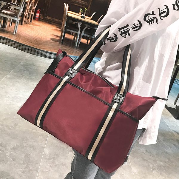 waterproof nylon simple duffel bag new fashion short-distance travel bag portable large-capacity shopping handbags
waterproof nylon simple duffel bag new fashion short-distance travel bag portable large-capacity shopping handbags