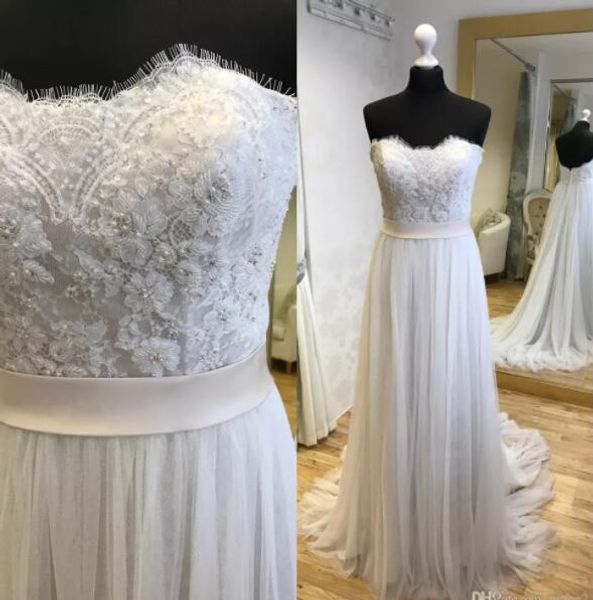 strapless sleeveless court train wedding dresses with appliques pears bridal gowns in stock, White
strapless sleeveless court train wedding dresses with appliques pears bridal gowns in stock, White