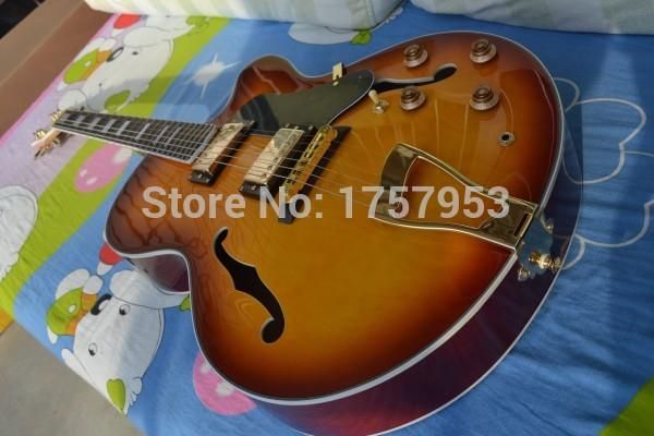 factory custom shop 2015 new l-5 l5 jazz guitar f -semi hollow sunburst color electric guitar in stock (hai 4
factory custom shop 2015 new l-5 l5 jazz guitar f -semi hollow sunburst color electric guitar in stock (hai 4