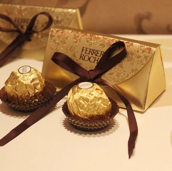 Свадебные и подарки Baby Shower бумага Candy Box Ferrero Rocher Коробка венчание сладких подарки
Свадебные и подарки Baby Shower бумага Candy Box Ferrero Rocher Коробка венчание сладких подарки