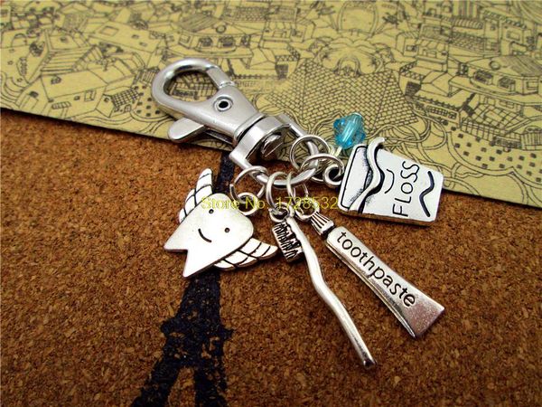 key chain dental hygienist keychain antique silver tooth fairy /dental floss/ toothbrush/toothpaste
key chain dental hygienist keychain antique silver tooth fairy /dental floss/ toothbrush/toothpaste