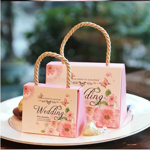 Wedding Candy Box Romantic Kraft Gift Box Hand Bag Wedding Favors and Gifts Bag Party Supplies Sweet Bag 095
Wedding Candy Box Romantic Kraft Gift Box Hand Bag Wedding Favors and Gifts Bag Party Supplies Sweet Bag 095