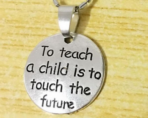 10pc/lot 2018 new arrival pendant necklace to teach a child is to touch the future teacher necklace gift for graduate drop shipping, Silver
10pc/lot 2018 new arrival pendant necklace to teach a child is to touch the future teacher necklace gift for graduate drop shipping, Silver
