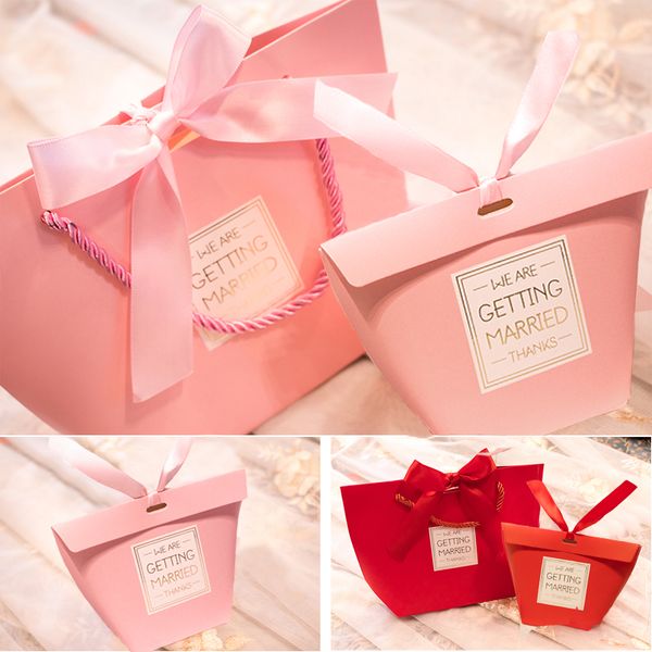 10pcribbon pink wedding chattering hand-held bag bag gift box wholesale wedding candy box creative romantic korean style
10pcribbon pink wedding chattering hand-held bag bag gift box wholesale wedding candy box creative romantic korean style