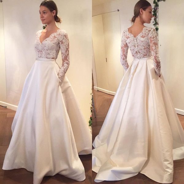 2018 sheer long sleeve v-neck lace wedding dresses a-line with pocket satin skirt see though back bridal party dress wedding gowns, White
2018 sheer long sleeve v-neck lace wedding dresses a-line with pocket satin skirt see though back bridal party dress wedding gowns, White