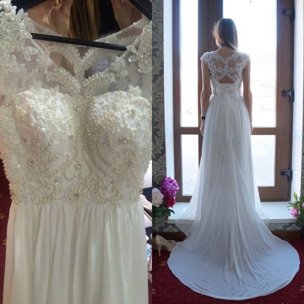 потрясающий чешский пляж свадебное платье sheer шеи без рукавов открытой спиной жемчуг бисером кружева аппликации шифон свадебные платья с л, White
потрясающий чешский пляж свадебное платье sheer шеи без рукавов открытой спиной жемчуг бисером кружева аппликации шифон свадебные платья с л, White