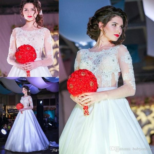 sheer long sleeves a line wedding dresses appliques beaded illusion bodice dubai arabic bridal gowns custom made 170, White
sheer long sleeves a line wedding dresses appliques beaded illusion bodice dubai arabic bridal gowns custom made 170, White