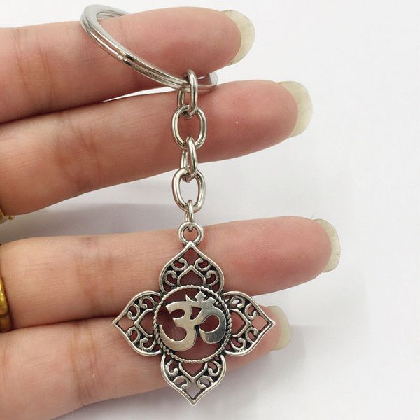1pcs filigree ohm om aum buddha lotus silver keychain pendant , buddhist, yoga keychain
1pcs filigree ohm om aum buddha lotus silver keychain pendant , buddhist, yoga keychain