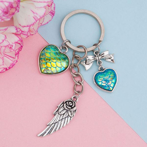 doreen box zinc based alloy silver tone key chain ab color mermaid scale cabochon silver wing pendant fashion jewelry,1pc
doreen box zinc based alloy silver tone key chain ab color mermaid scale cabochon silver wing pendant fashion jewelry,1pc