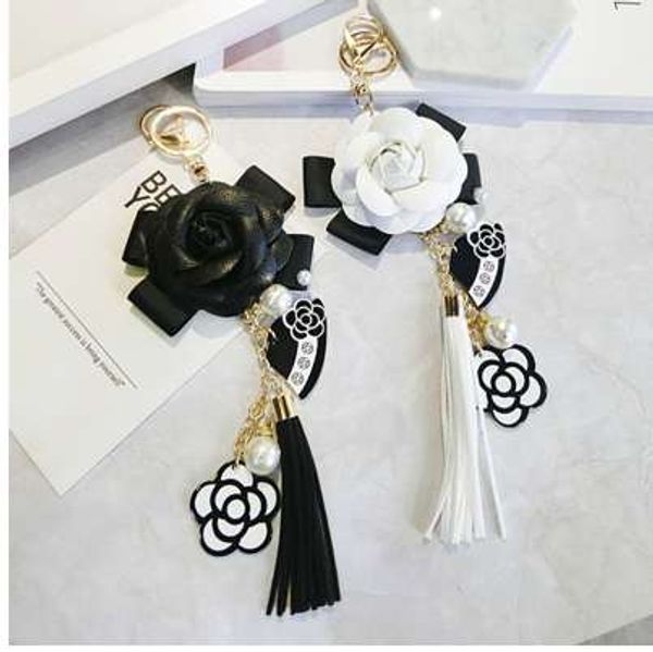 famous keyring black white leather camellia flower keychain women fashion flower key chains llaveros flore bag charms, Silver
famous keyring black white leather camellia flower keychain women fashion flower key chains llaveros flore bag charms, Silver
