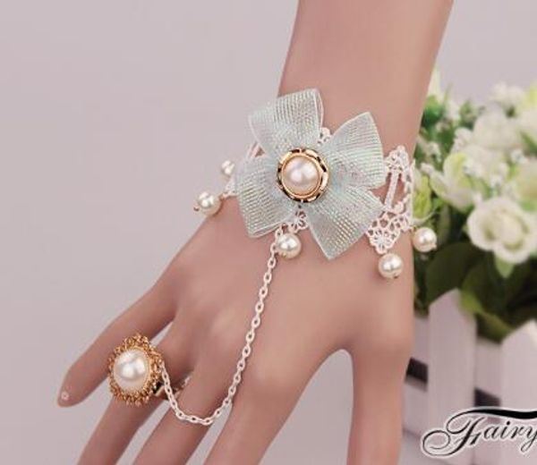new lolita original new white lace pearl handmade bracelet with a finger chain is fashionable and elegant, Golden;silver
new lolita original new white lace pearl handmade bracelet with a finger chain is fashionable and elegant, Golden;silver