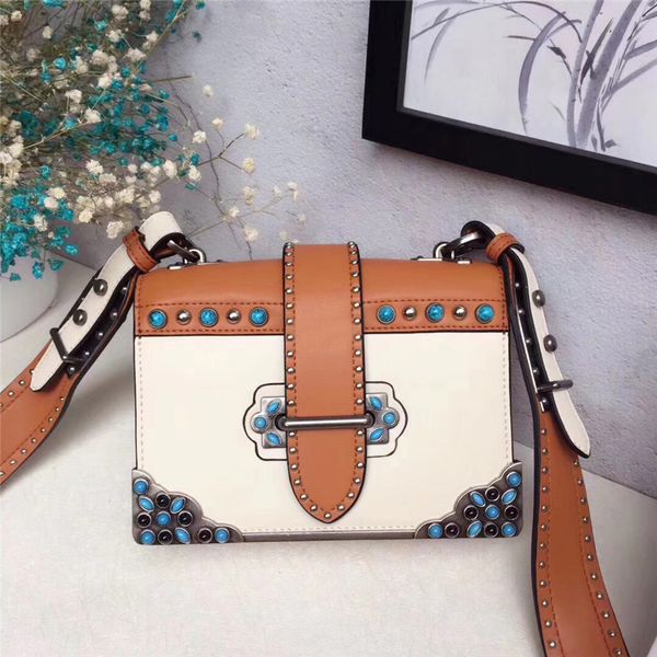 women genuine cow leather designer handbags brand fashion handbag metal rivert bowlder decoration crossbody messenger bag
women genuine cow leather designer handbags brand fashion handbag metal rivert bowlder decoration crossbody messenger bag