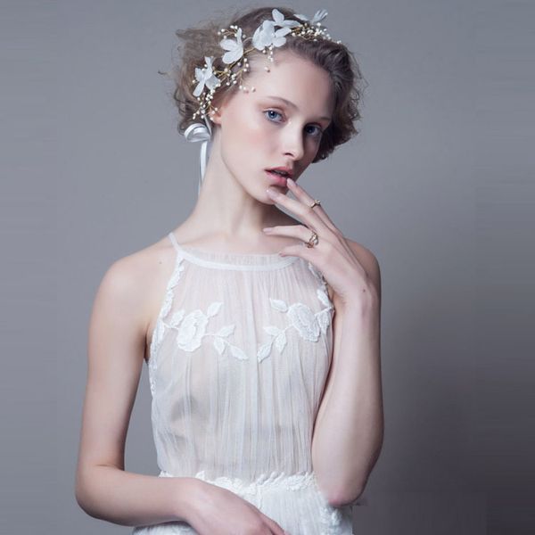 new flower korean version of the hand-beaded beaded hair accessories, Golden;white
new flower korean version of the hand-beaded beaded hair accessories, Golden;white