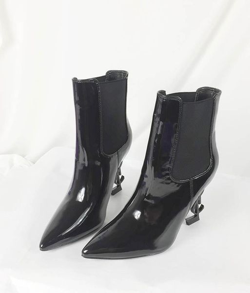 black slip on thrill heel women ankle boots pointed toe letter high heel shoes women tribute leather fashion runway short boots 
black slip on thrill heel women ankle boots pointed toe letter high heel shoes women tribute leather fashion runway short boots