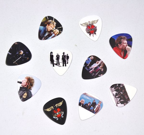 Много 100 шт Rock Band Bon Jovi Medium 0.71mm 2-х сторон печать медиаторы плектры
Много 100 шт Rock Band Bon Jovi Medium 0.71mm 2-х сторон печать медиаторы плектры