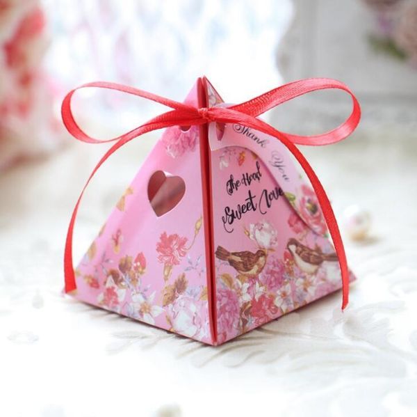 european creative paper triangle candy box pyramid candy box new wedding supplies wedding candy box wholesale
european creative paper triangle candy box pyramid candy box new wedding supplies wedding candy box wholesale