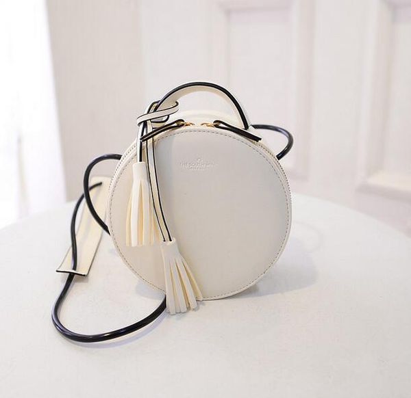 british retro fashion new handbags pu leather women bag round cute girl shoulder messenger bag tassel female bag d18102906
british retro fashion new handbags pu leather women bag round cute girl shoulder messenger bag tassel female bag d18102906