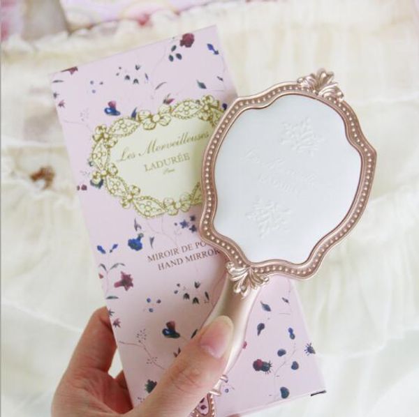 laduree les merveilleuses hand mirror n cosmetics makeup mirror compact vintage plastic holder make up pocket mirror
laduree les merveilleuses hand mirror n cosmetics makeup mirror compact vintage plastic holder make up pocket mirror