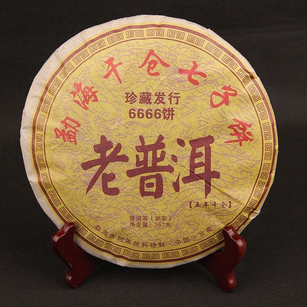 Чай Pu'er 357 г, старый торт Pu'er пять лет сухой склад Menghai сухой склад семь торт пригото
Чай Pu'er 357 г, старый торт Pu'er пять лет сухой склад Menghai сухой склад семь торт пригото